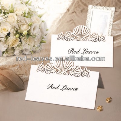 popular laser cut customizable paper sea shell wedding day seat table name place card